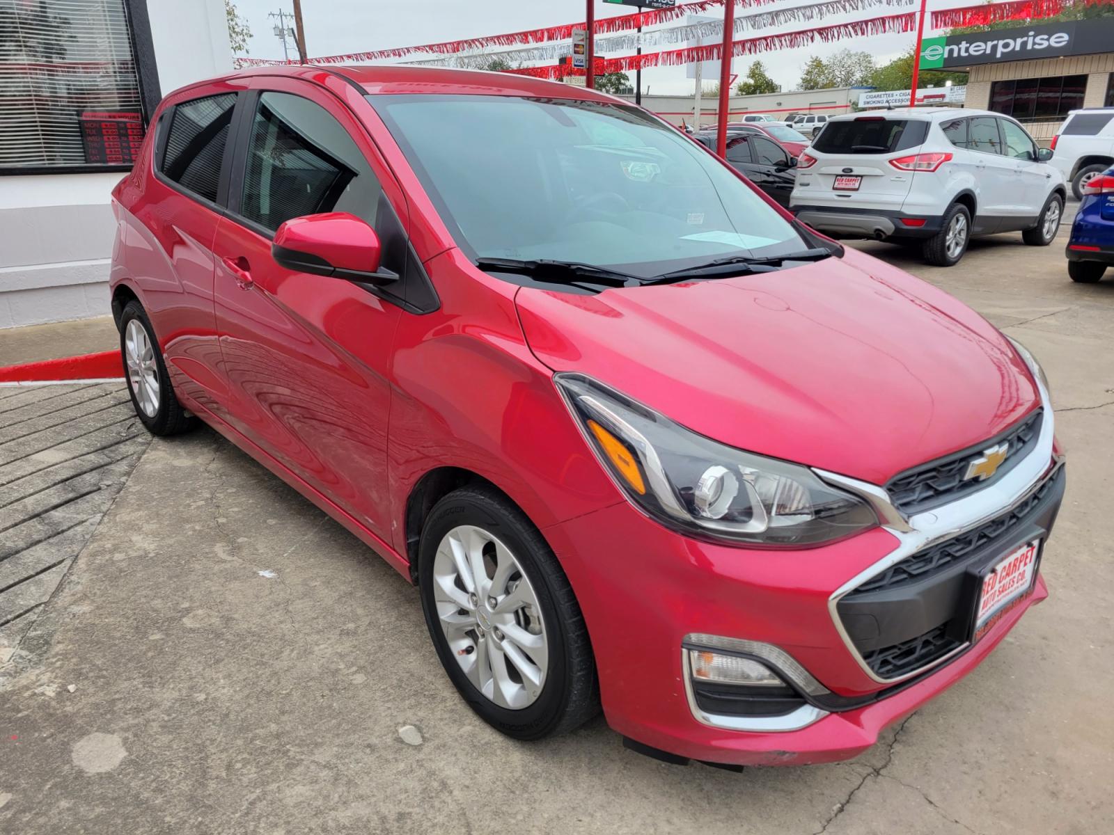 2020 Red Chevrolet Spark 1LT Manual (KL8CC6SA6LC) with an 1.4L L4 16V DOHC engine, 5 Speed Manual transmission, located at 503 West Court, Seguin, TX, 78155, (830) 379-3373, 29.568621, -97.969803 - 2020 Chevrolet Spark 1LT Manual with a 1.4L L4 16V DOHC, Standard Transmission, Tilt, Cruise, AM/FM Touchscreen Stereo, Power Windows, Locks and Side Mirrors, Bluetooth, Automatic Headlights, Tinted Windows, Alloy Wheels, Rear Wiper, Rear Defroster and more!! - Photo #1